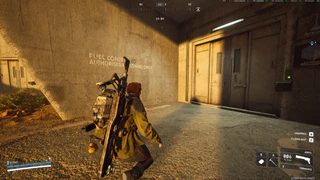 Enter through this door with "Fuel Control - Authorised Personnel Only" written next to it