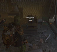 Inside the outpost, grab the flag from the bag located on the medical bed.