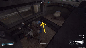 Image showing a box on the floor of a guard shack inside the tunnel that contains a spare key card for the Armored Transports quest.